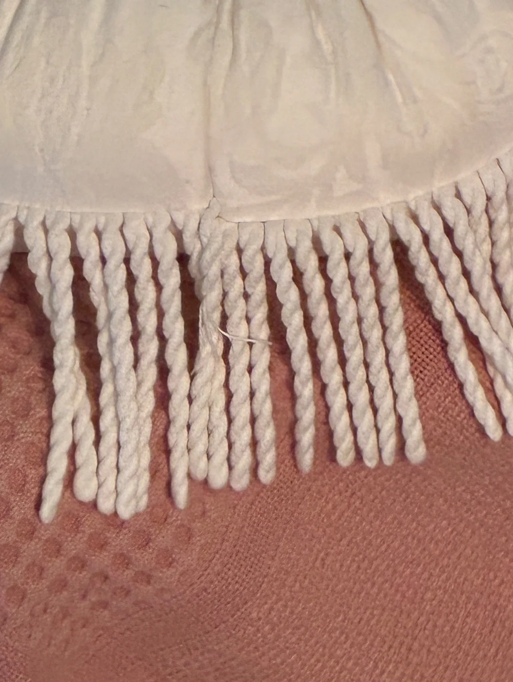 Round White accent Pillow with Twisted Fringe